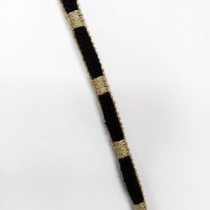 Dual tone tassel belt with cord