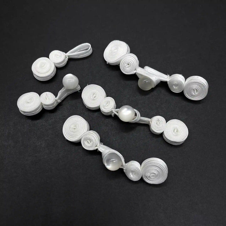 Pearl-Centered Spiral Frog Fastener