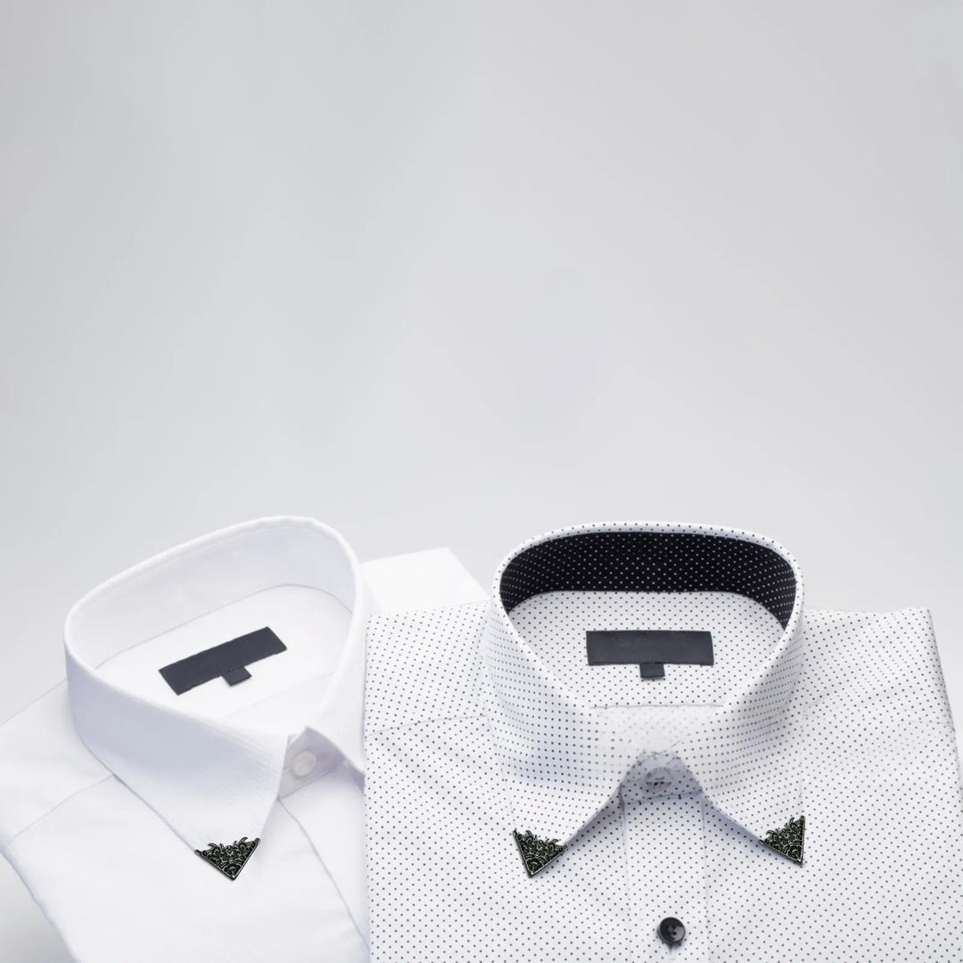Ani Accessories | Back triangle framed collar tip on  folded plain white shirt and black doted white shirt.