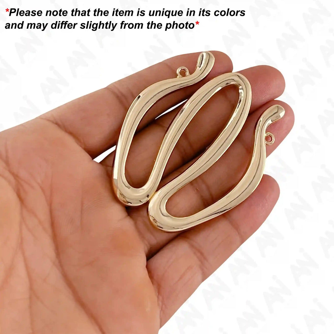 Ani Accessories Double Wave Design Metal Buckle/ Broach on the hand and written on the white background that product may slightly differ from the photo.