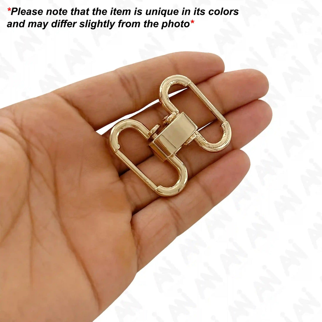 Ani Accessories Gold Interlocking Buckle on the palm with written caution of product may be slightly differ from the image in a white background.