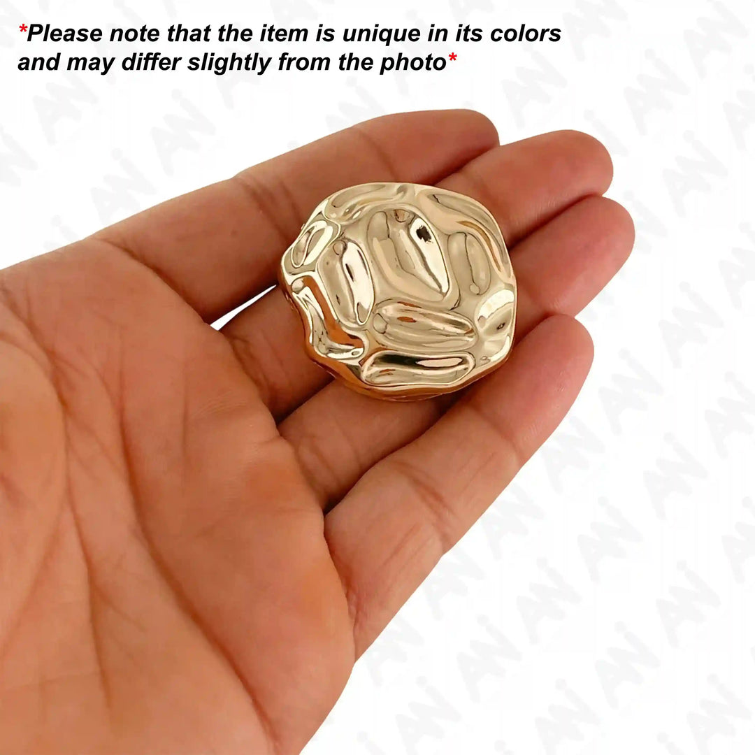 Ani Accessories Sculpted Gold Nugget Style Buckle on the hand with  text of caution product slightly differ from the photo.