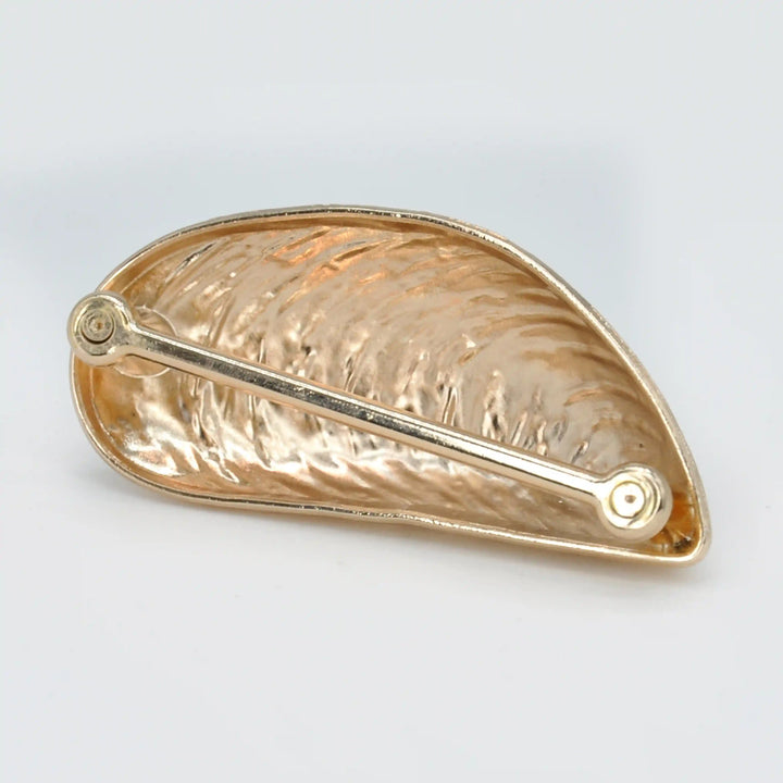 Ani Accessories Shell-Shaped Ornamental Buckle Backside image in the white background.