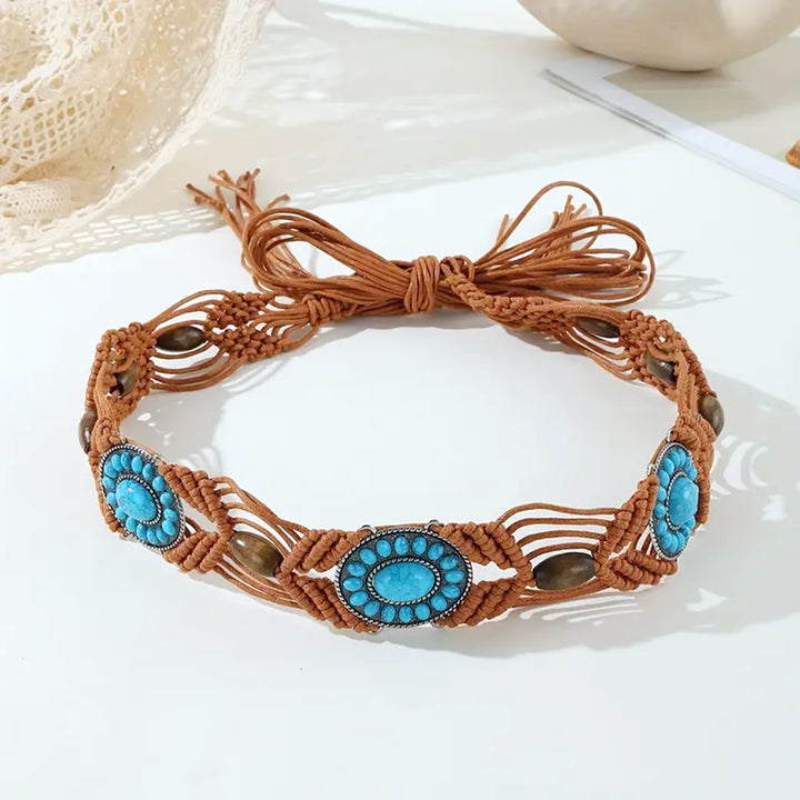 Ani Accessories Womens Belt Extreme close-up on the metal setting of one medallion, showing the oxidized silver-tone finish and the small, seed-like blue accent stones framing the central turquoise cabochon.