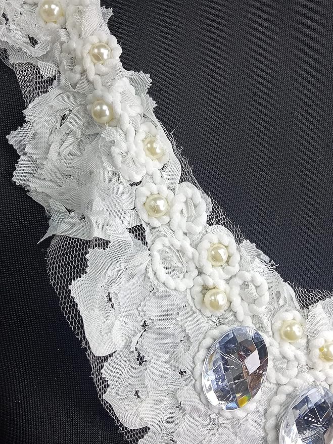 Ani Accessories closeup shot showcasing pearl floral motifs with oval diamond detailing