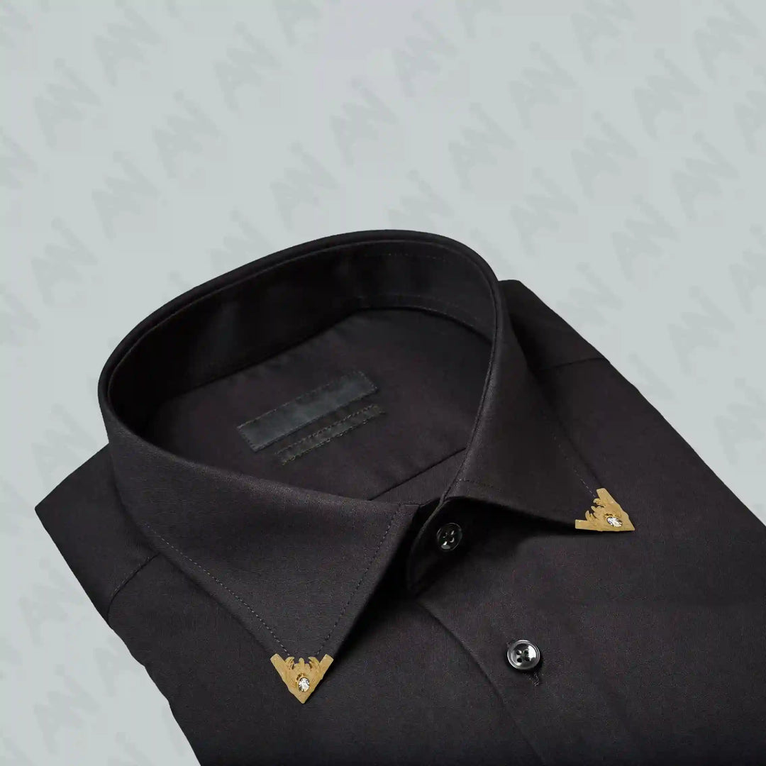 Ani Accessories |  Gold intricate with rhinestone collar tip on black folded shirt 