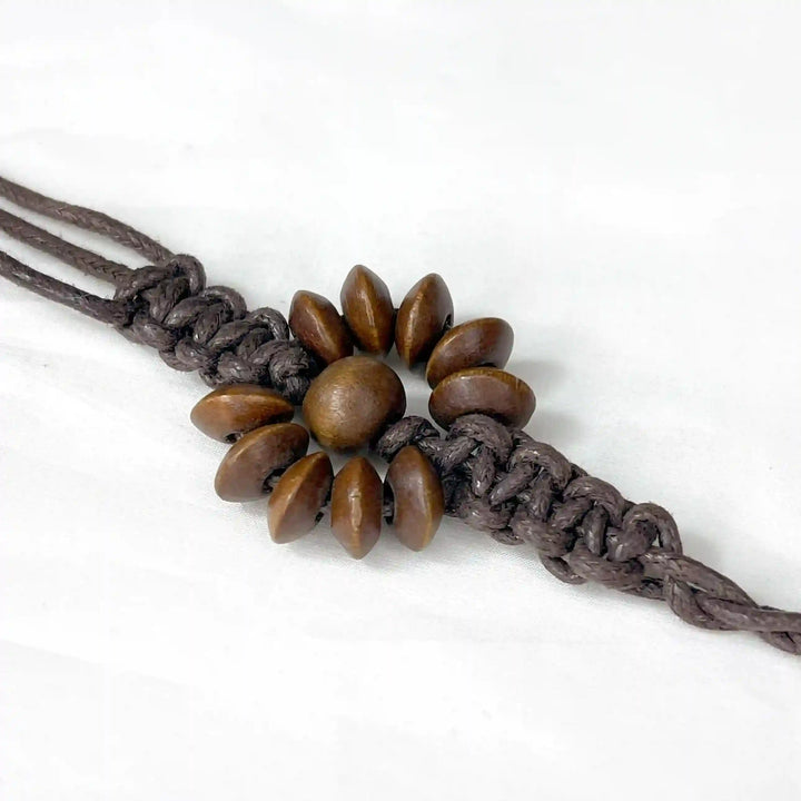 Ani Accessories women’s belt showing detailed design and texture.
Daisy dark brown belt on white background.