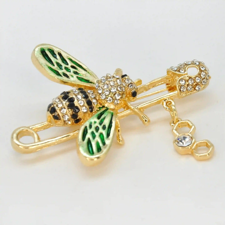 Ani Accessories close photo of honey bee rhinestone design on white background for fashion accessories.