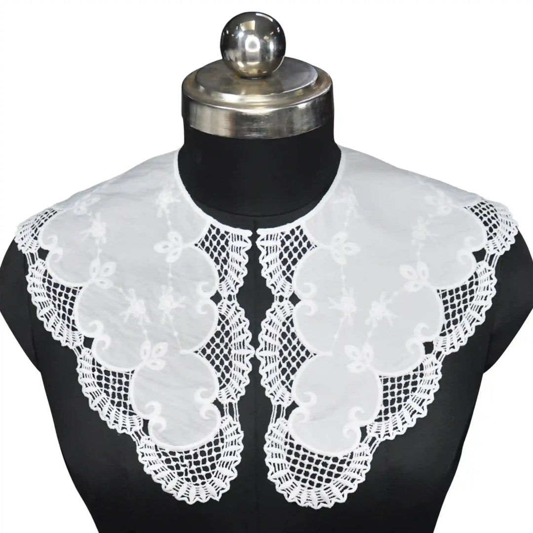 Feminine Broderie Anglaise Peter Pan collar adorned with detailed eyelet embroidery and elegant finish
