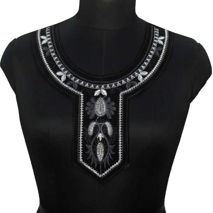 Black velvet with silver embroidery neckline