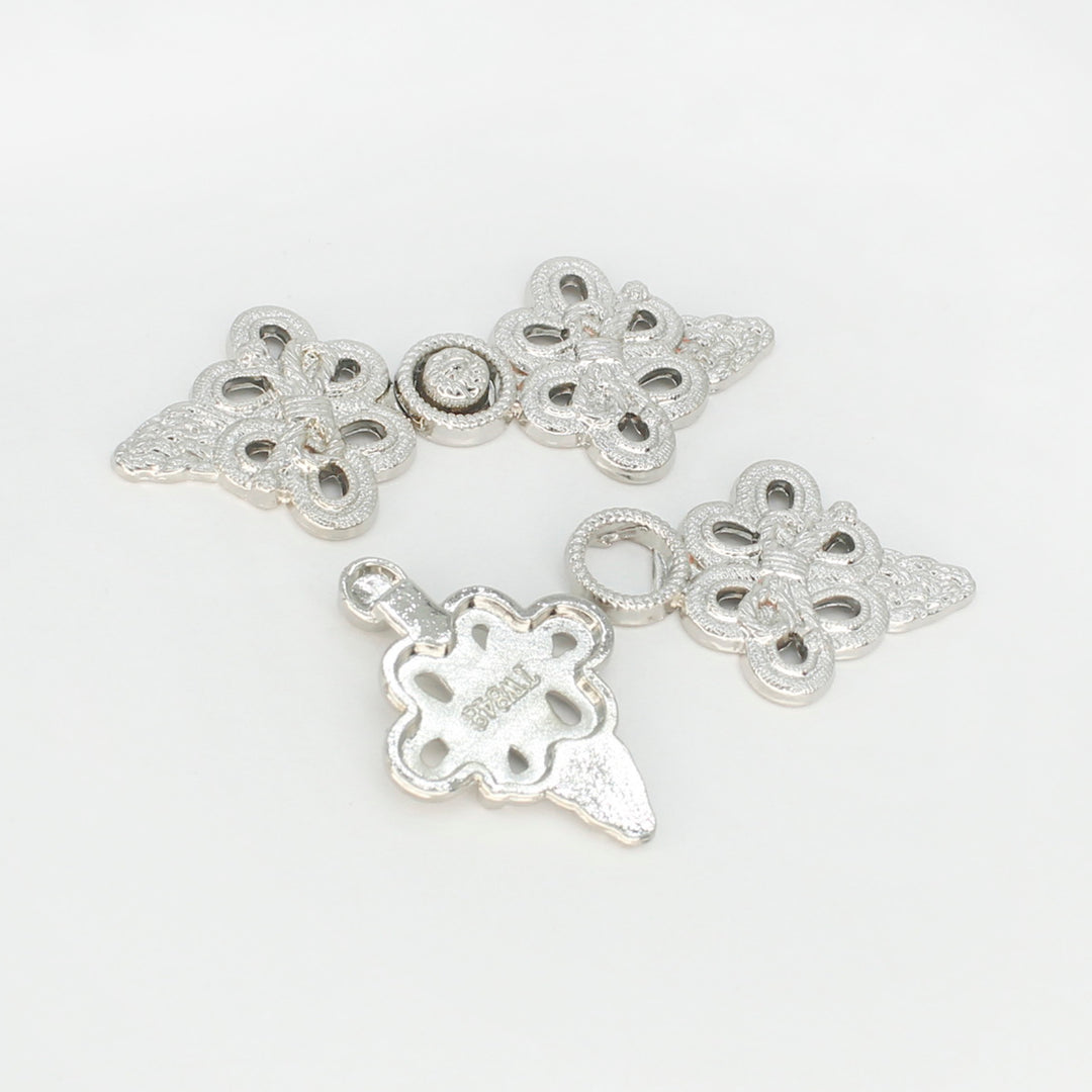 Symmetrical floral design Frog closure metal button