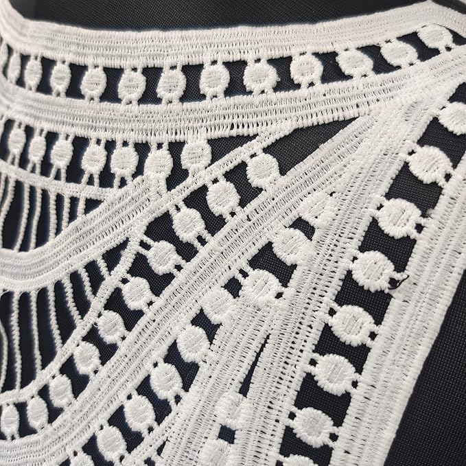 Macro close-up of large neckline by Ani Accessories showcasing intricate detailing on women’s garment