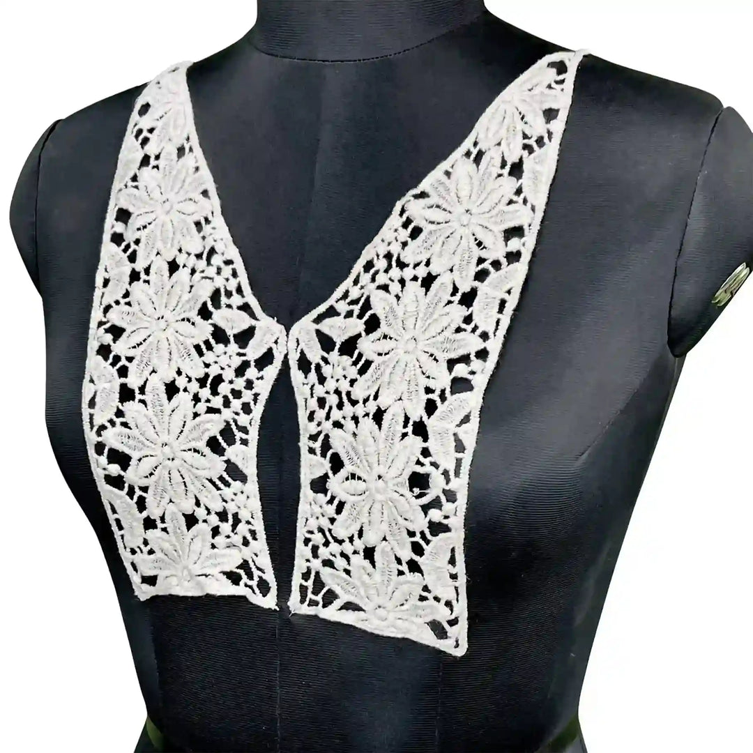 ANI Accessories 2 part V neckline patch in white with daisy flower cutwork, a dyeable V neck patch pair for kurti and suits, shown on a black mannequin 