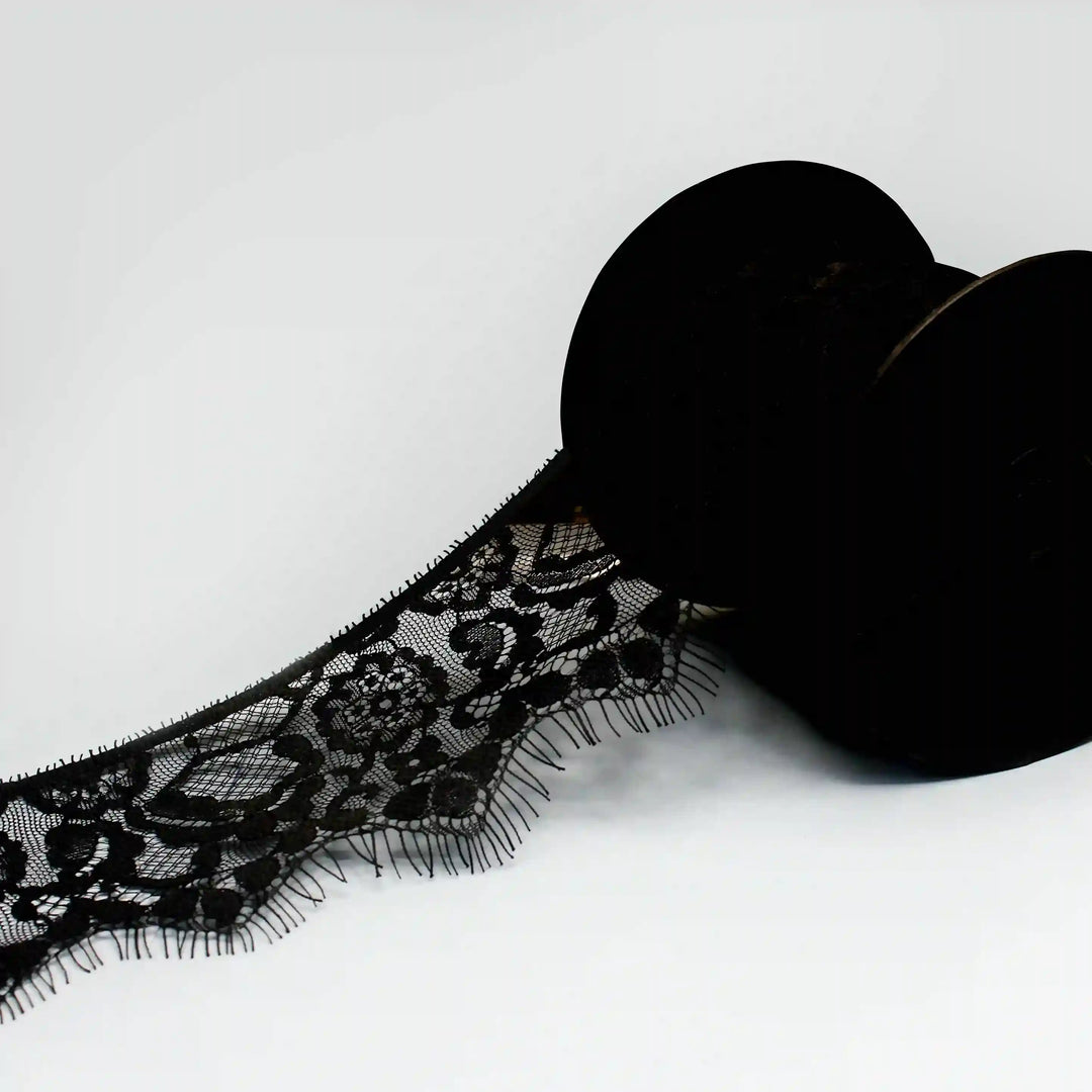 Black Floral Lace Trim Eyelash for Sewing & Crafts | Ani Accessories on a spool with decorative design