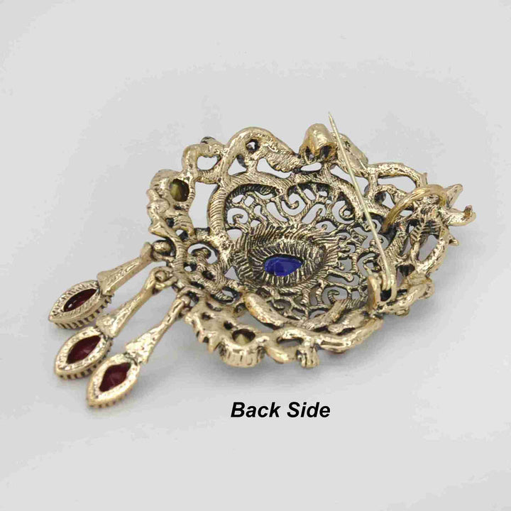 ANI Accessories antique brooch for women with blue, red and green stones on green satin 