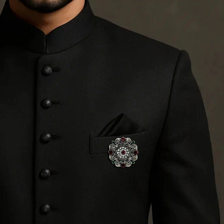 ANI Accessories antique silver brooch on the chest of a black jodhpuri suit 