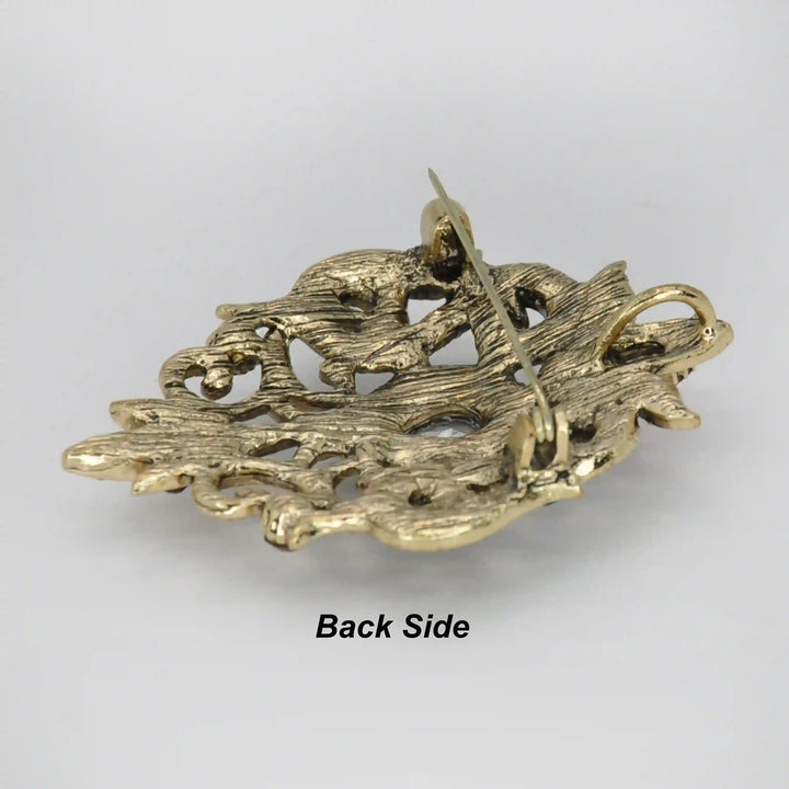 ANI Accessories baroque brooch back side showing the antique gold base and pin 