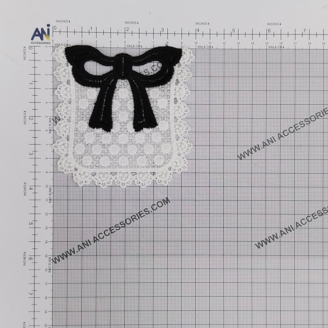 ANI Accessories black bow pocket patch on a measuring grid: 4 x 4 inches (10 x 10 cm) 