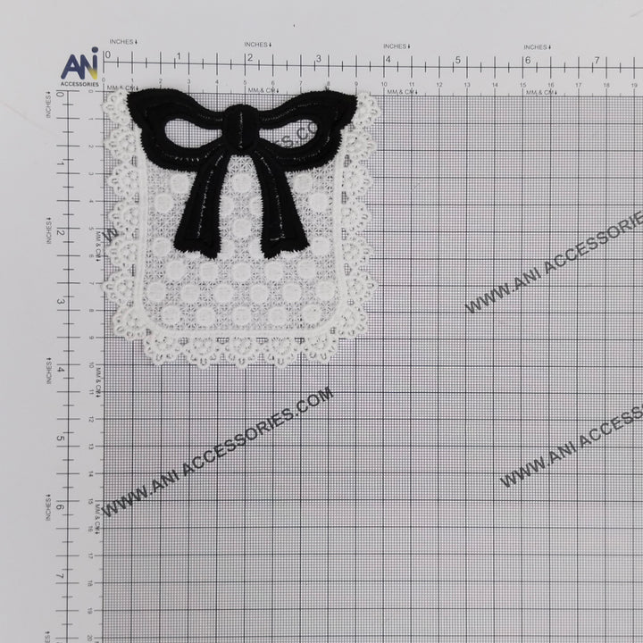 ANI Accessories black bow pocket patch on a measuring grid: 4 x 4 inches (10 x 10 cm) 