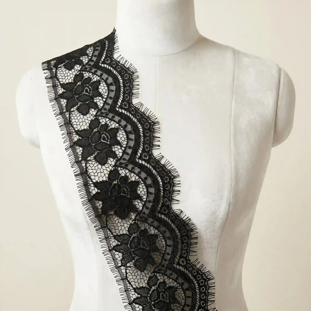 ANI Accessories black Chantilly lace trim draped on a mannequin