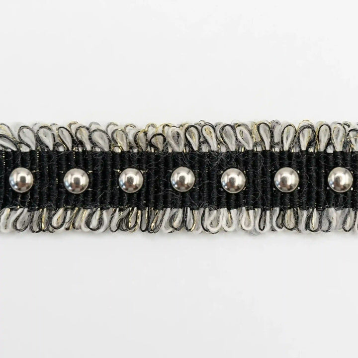 ANI Accessories black denim lace with silver metal studs and frayed edges, laid flat with white color Background 