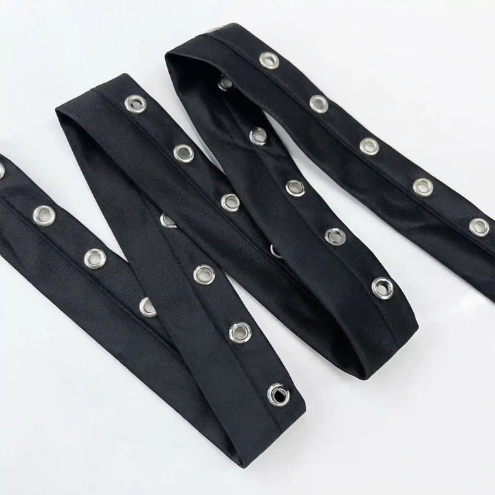 ANI Accessories black eyelet tape for lace-up corsets, folded in a zigzag with white color background 