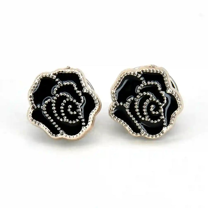 ANI Accessories two black rose enamel pins with silver outline on white color background 
