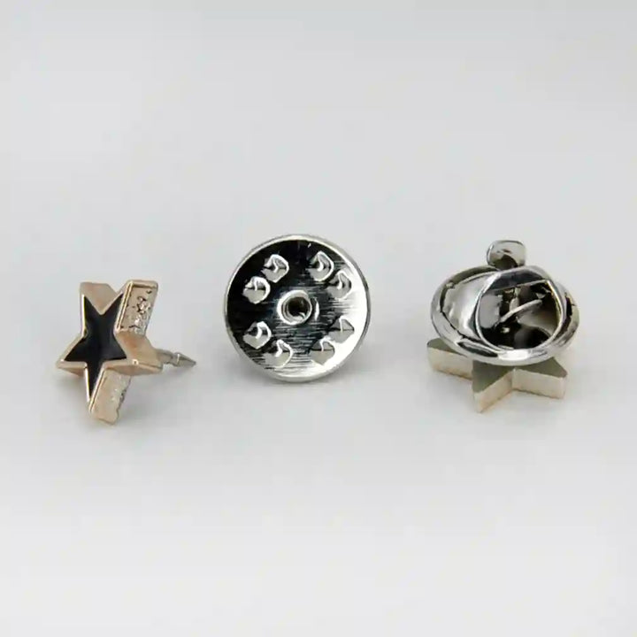 ANI Accessories black star enamel pin shown from the side with its butterfly clutch back with white color background 