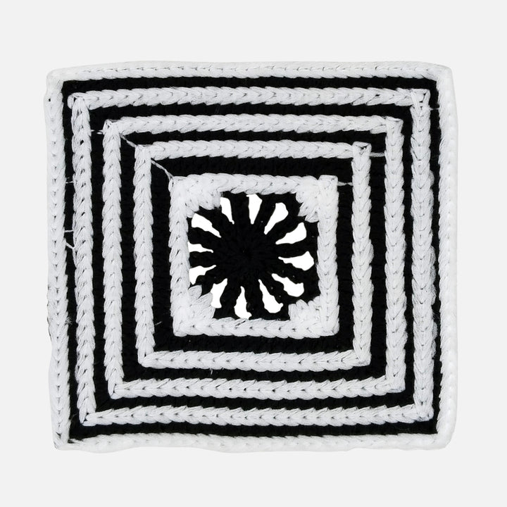 ANI Accessories black and white granny square patch in spun poly with a black flower centre 