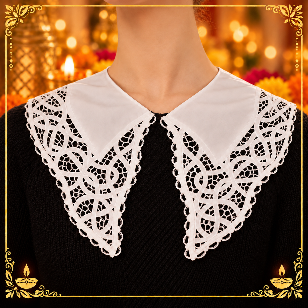 White pointed cutwork lace collar on a black dress with a festive frame 