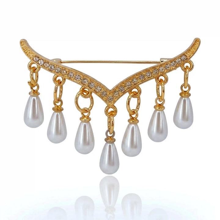 ANI Accessories chevron tassel pearl brooch pin with gold V-shaped rhinestone bar and seven pearl drops with white color background 