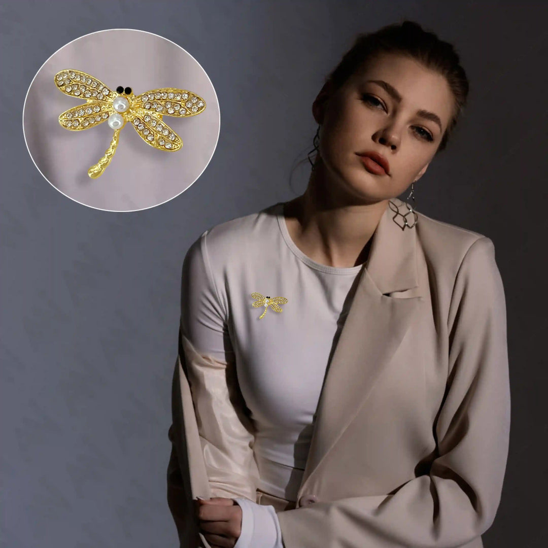 Stunning dragonfly pearl brooch by Ani Accessories featuring intricate design and sparkling details