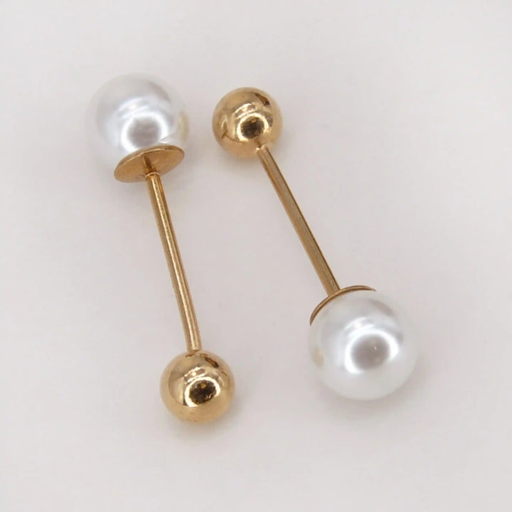 Two dual pearl balance pins with a white pearl and a gold ball on each bar 