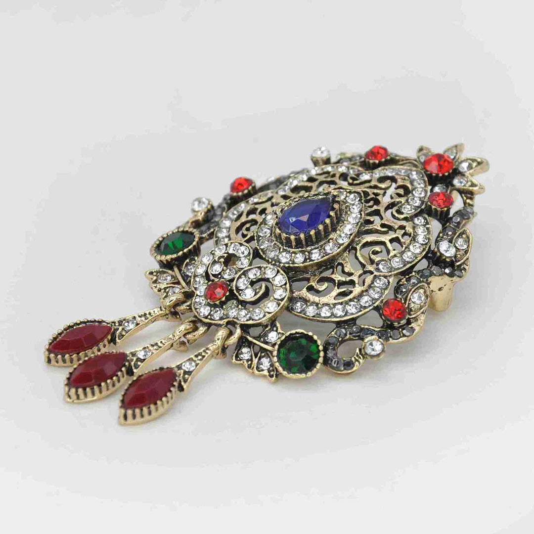 ANI Accessories Edwardian style brooch held in hand to show its size 
