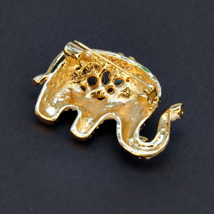 ANI Accessories elephant brooch back side showing the gold base and pin 