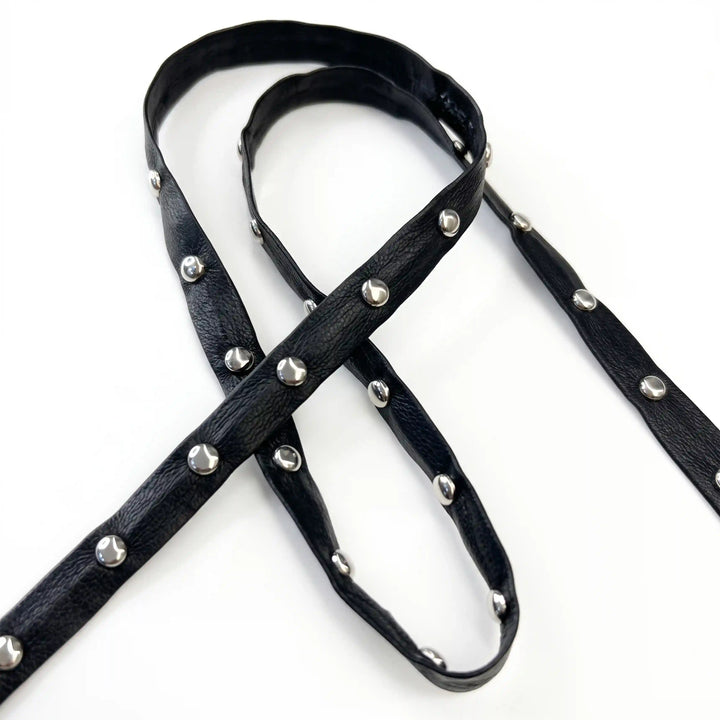 ANI Accessories faux leather strip with studs for chokers, bracelets and crafts with white color background 