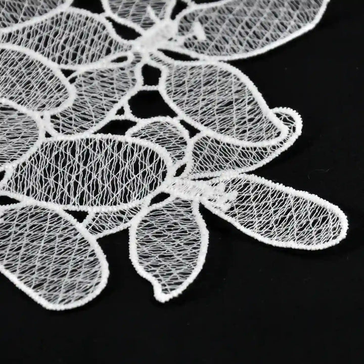 ANI Accessories close-up of oval petals with a dotted outline on a white flower patch 