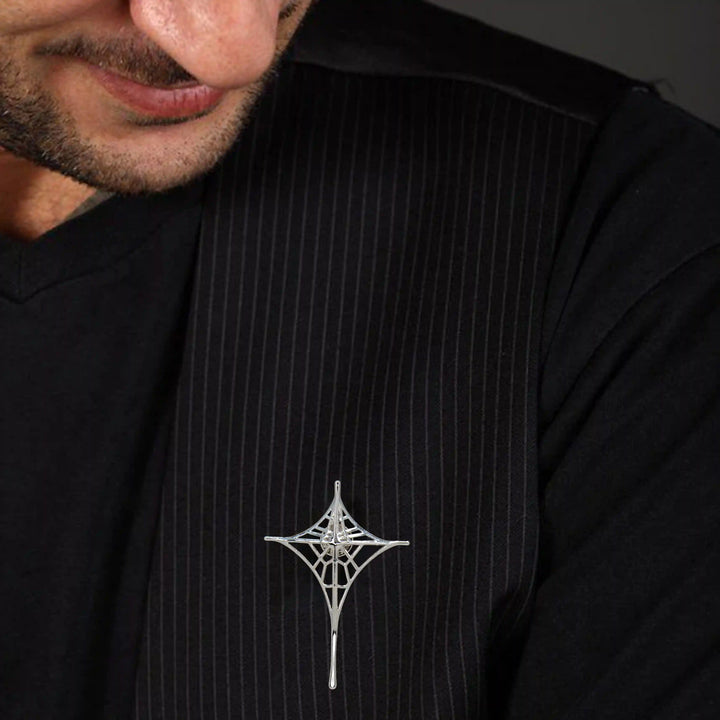 ANI Accessories gothic silver brooch pinned on the chest of a black shirt