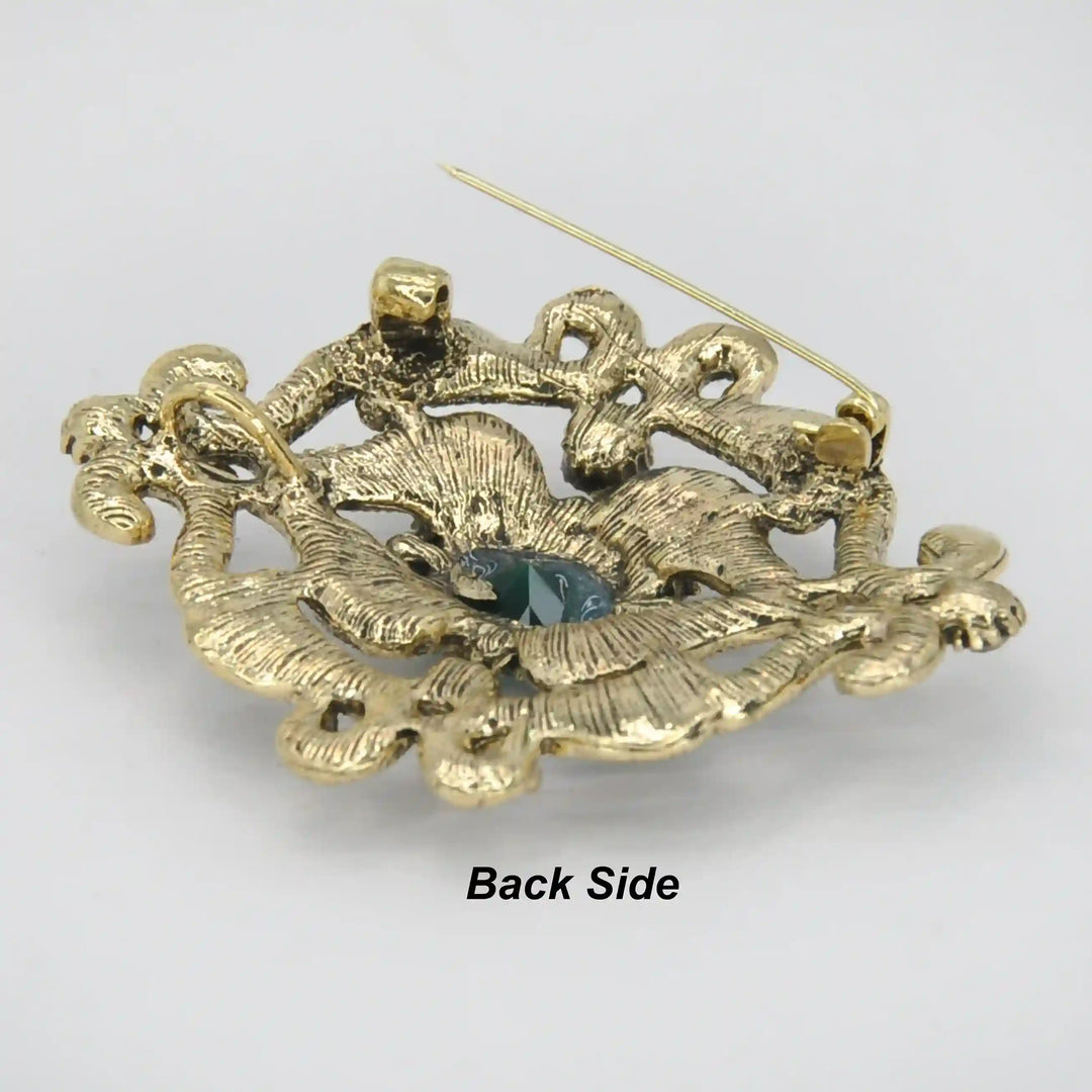 ANI Accessories baroque brooch back side showing the antique gold base and pin 