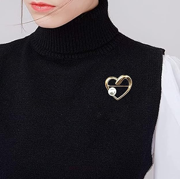 Heart Brooch with Single Pearl for Casual & Formal Wear, featured on a stylish black sweater.