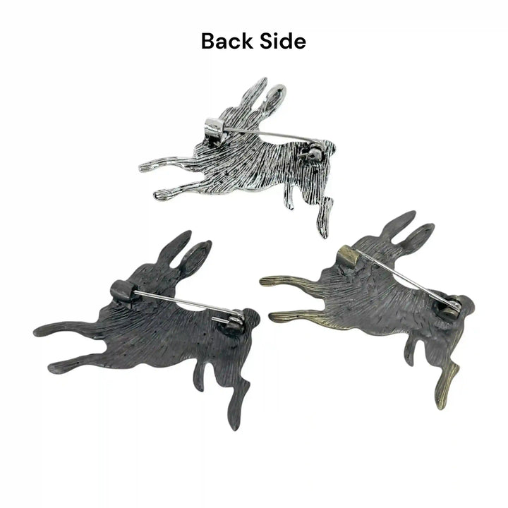 ANI Accessories leaping rabbit brooches back side showing the pin in all three colours 