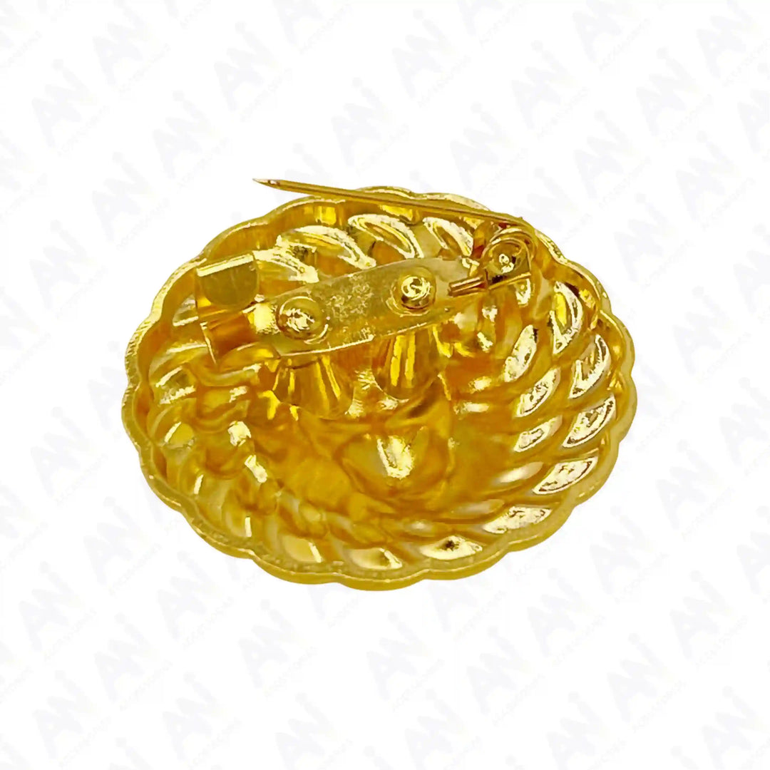 Angled back view of the lion head gold brooch with pin and gold base 