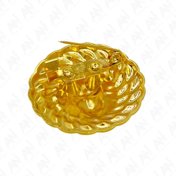 Angled back view of the lion head gold brooch with pin and gold base 
