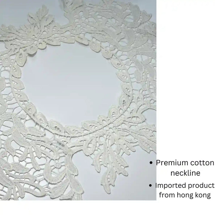 Close-up of round cutwork neckline by Ani Accessories showing intricate floral craftsmanship and detailed design on women’s garment