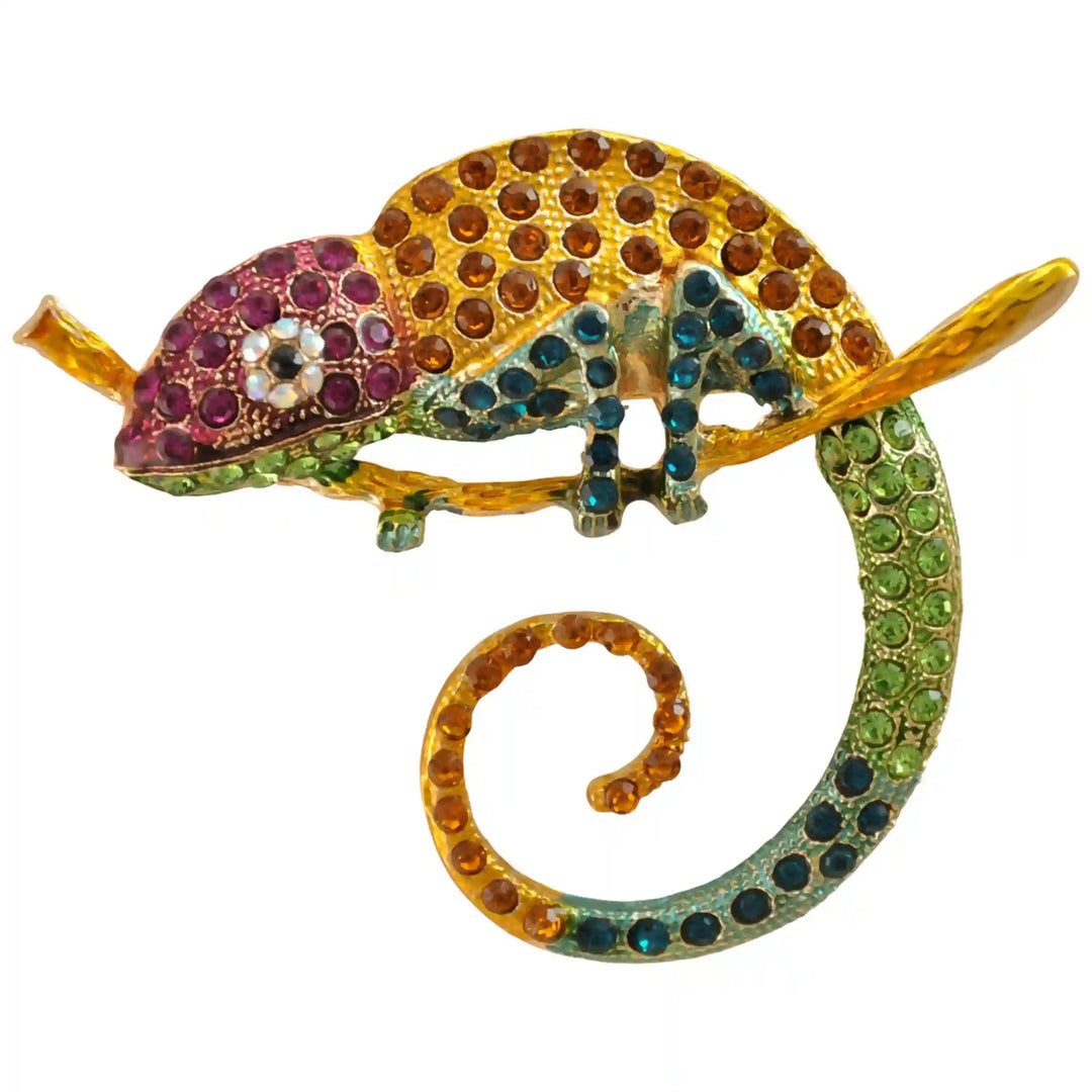 Pink chameleon brooch with amber body and green spiral tail with white color background 
