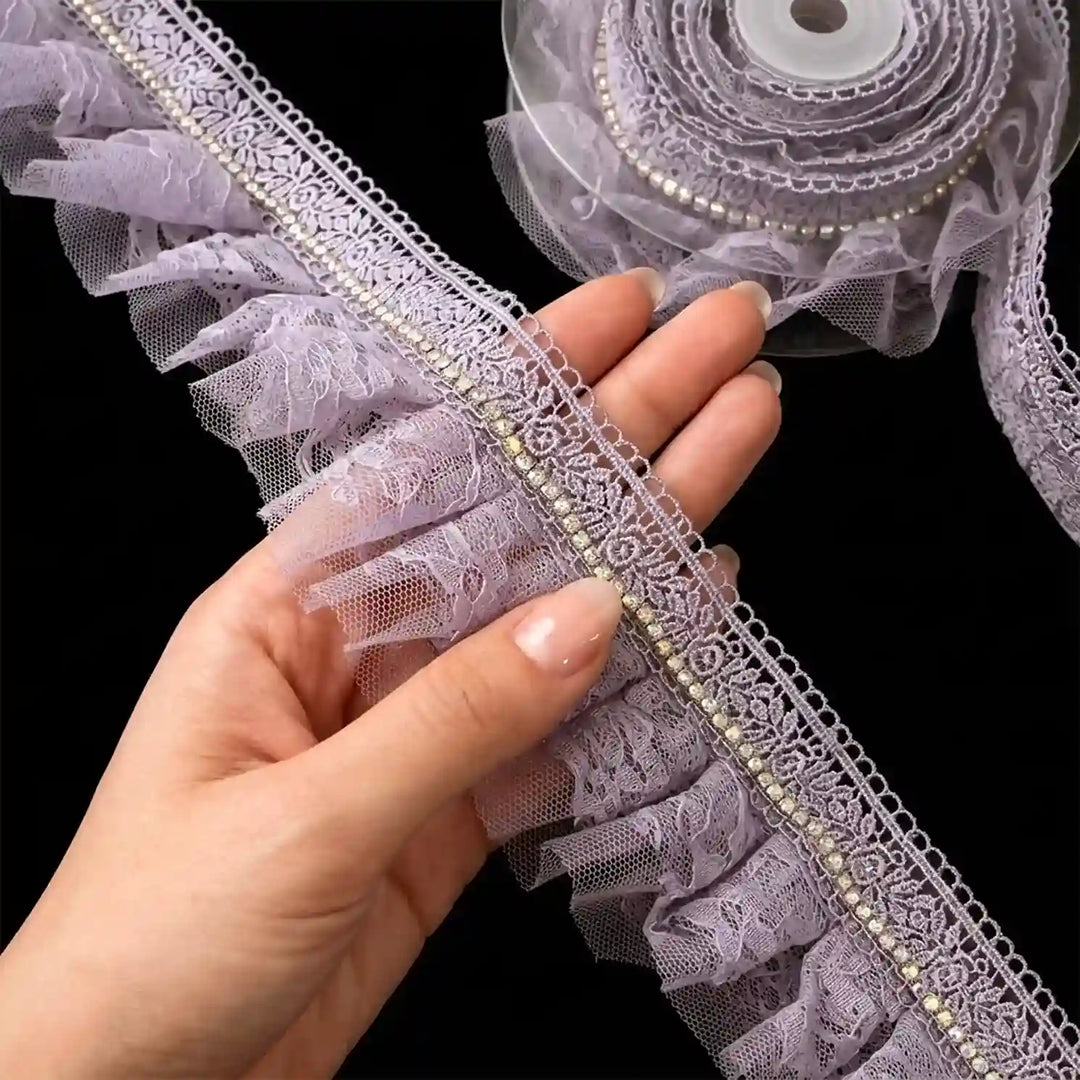 ANI Accessories purple ruffle fringe lace held in hand showing the gathered net frill with black color background 