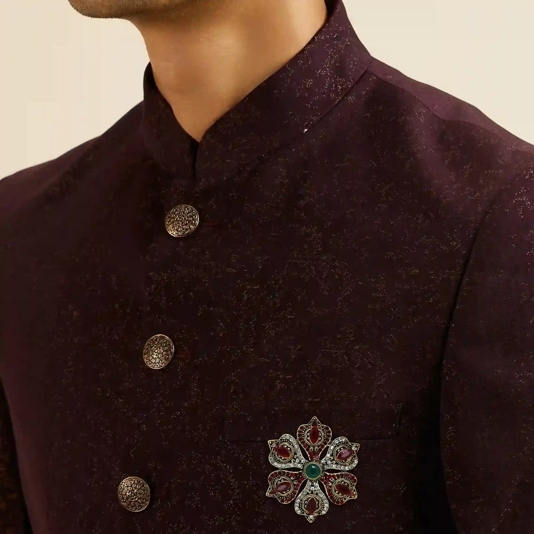 ANI Accessories red stone brooch for men on the chest of a maroon sherwani 