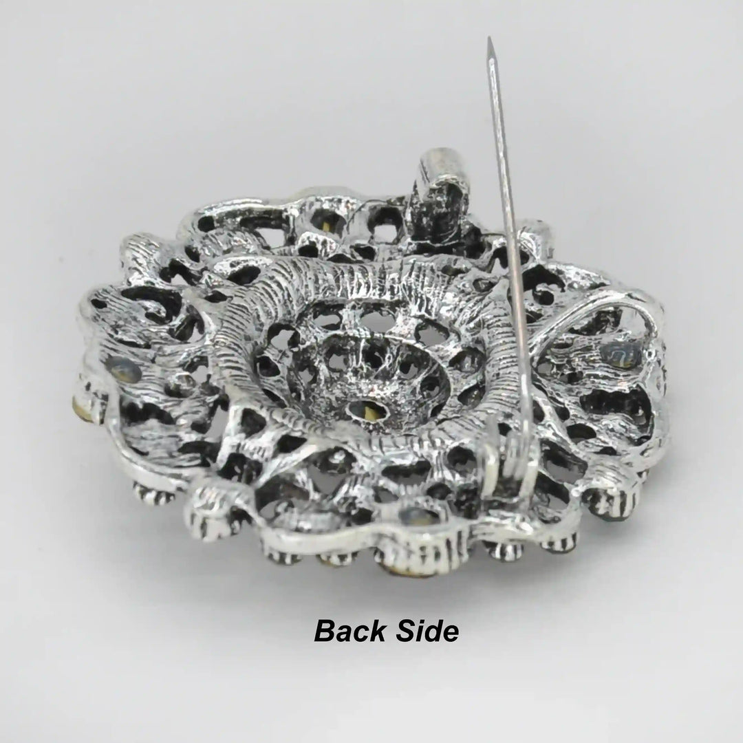 ANI Accessories regal bloom vintage brooch back side showing the pin 