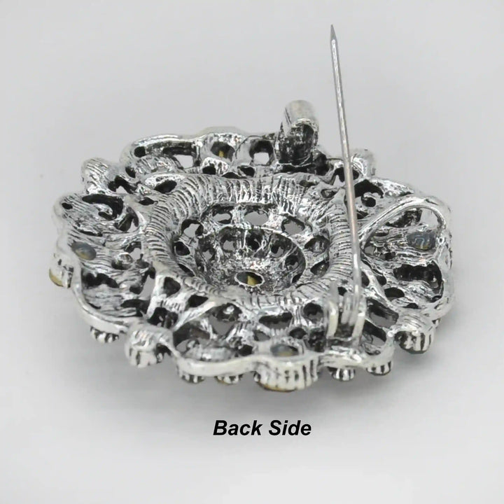 ANI Accessories regal bloom vintage brooch back side showing the pin 