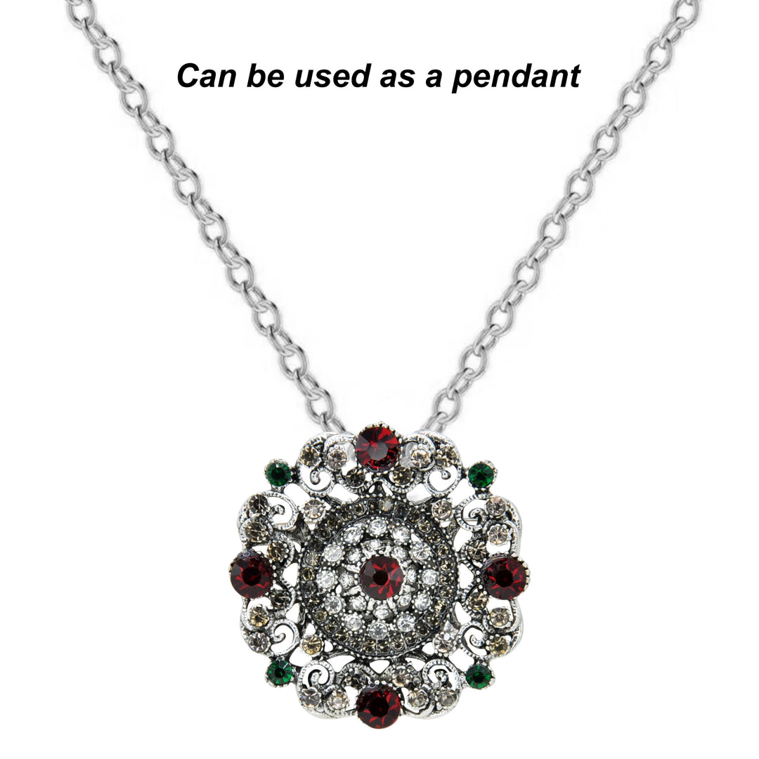ANI Accessories regal bloom brooch worn as a pendant on a silver chain 